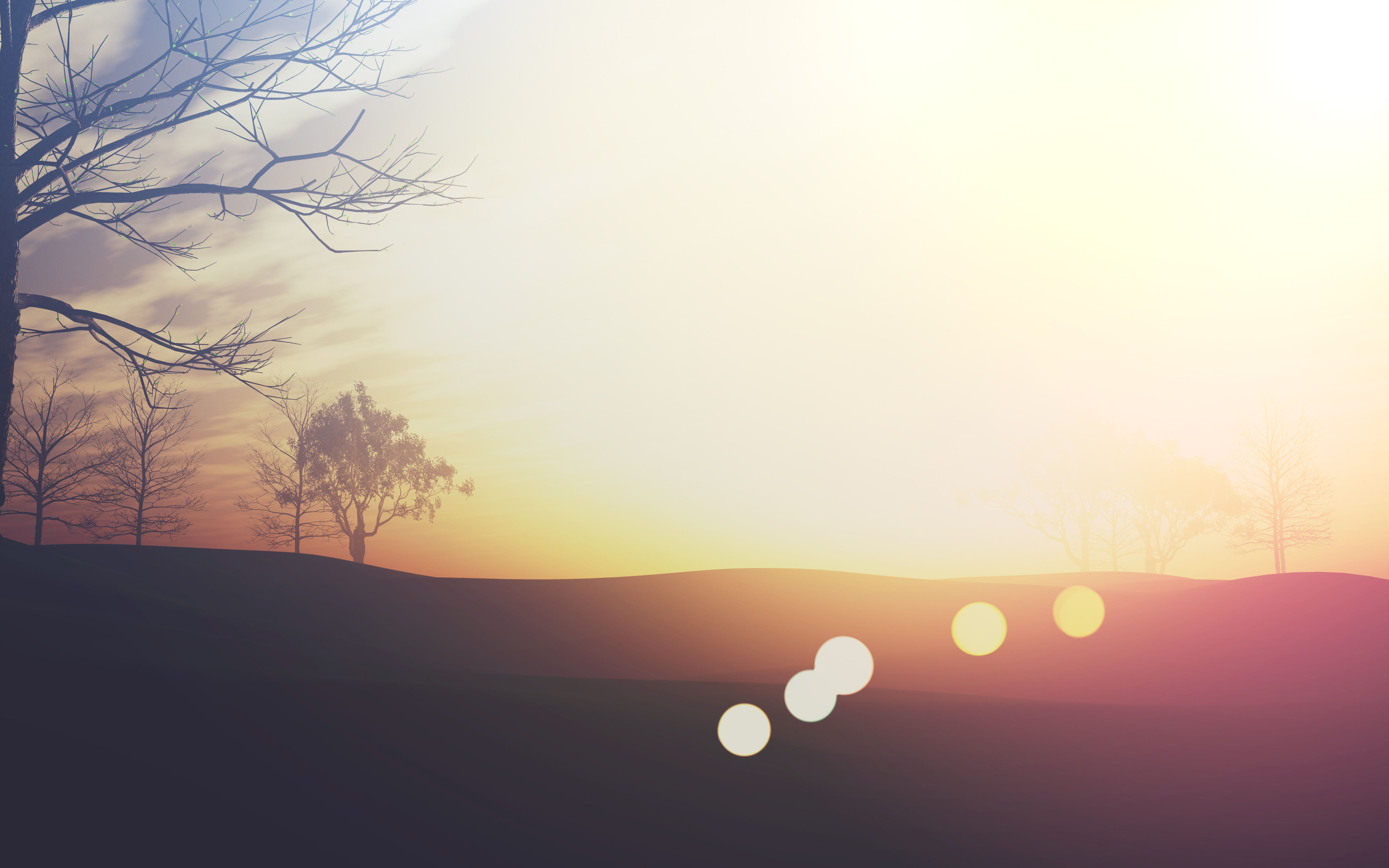 A breathtaking sunrise, with the sun peeking over the horizon and casting a warm glow over the landscape.